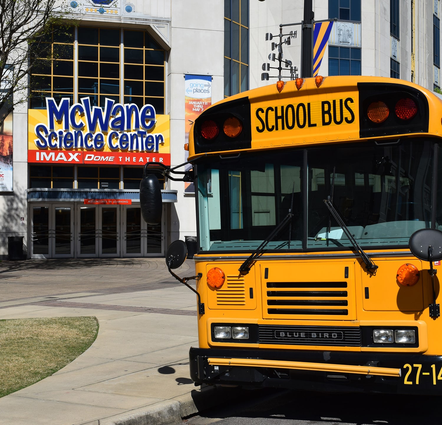 a school bus parked in front of a building